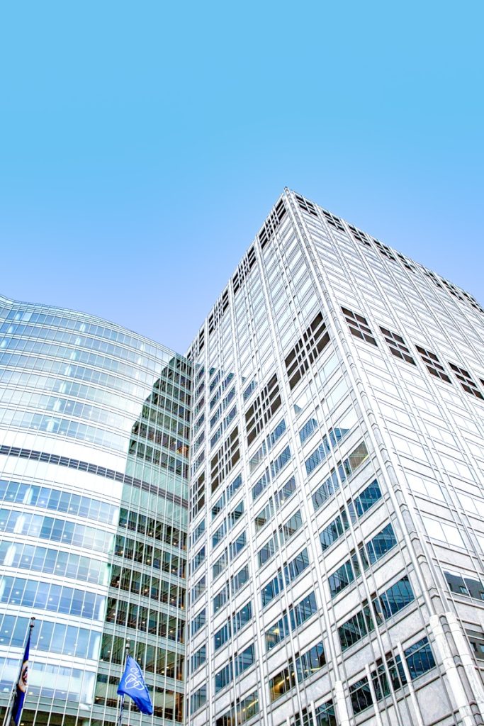 white concrete building under blue sky during daytime